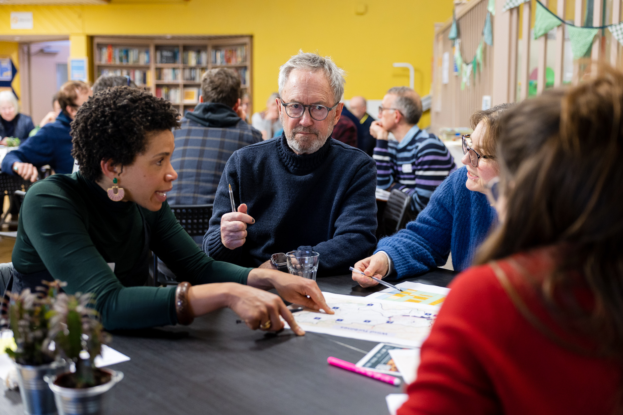 People talking at a community energy event