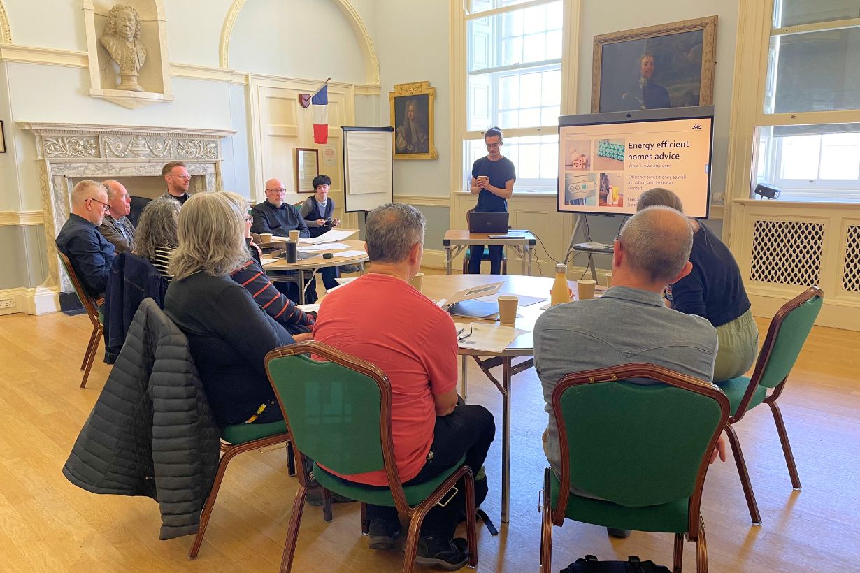 Group of people getting Energy Champion training