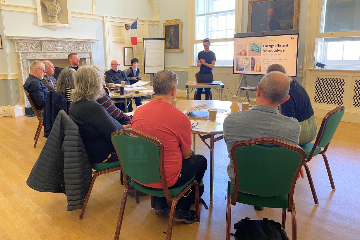 People receiving energy champion training.