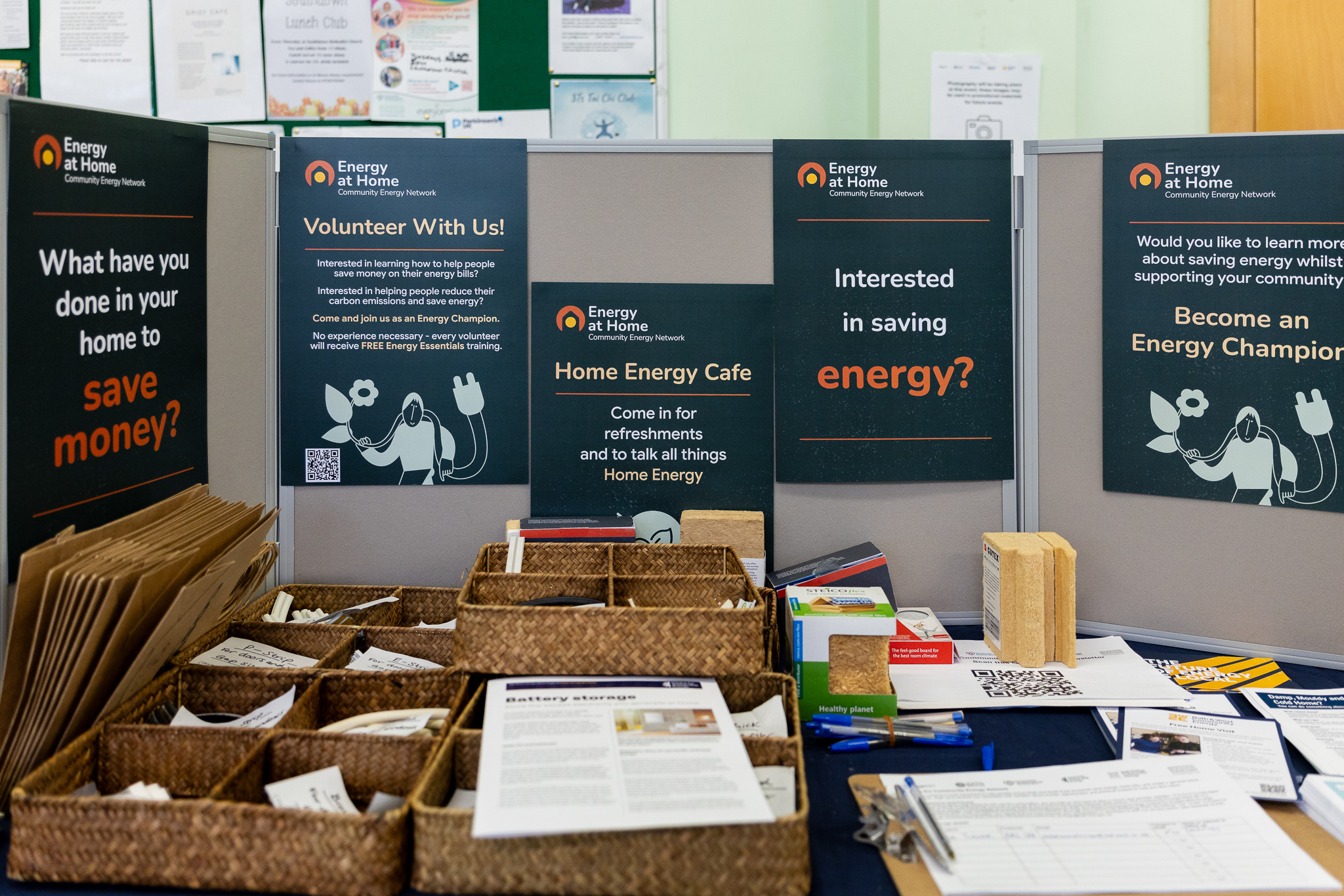 Energy cafe table with posters.