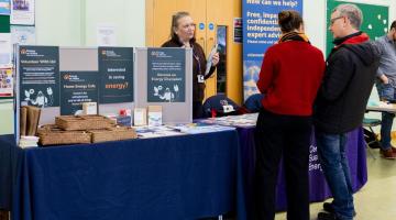People attending a home energy event