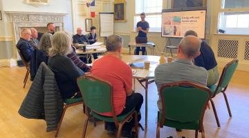 People receiving energy champion training.