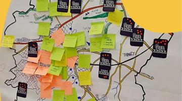 A map with postit notes from a workshop