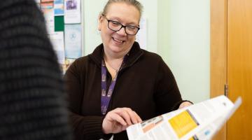 Jo advising a member of the public